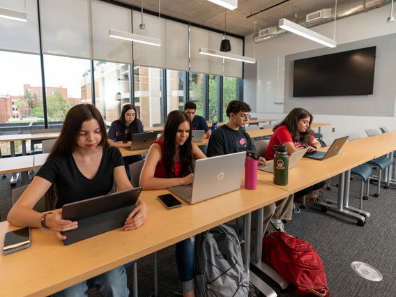 Students working at a desk.