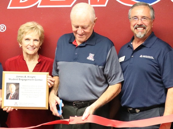 Picture of James A Knight cutting ribbon