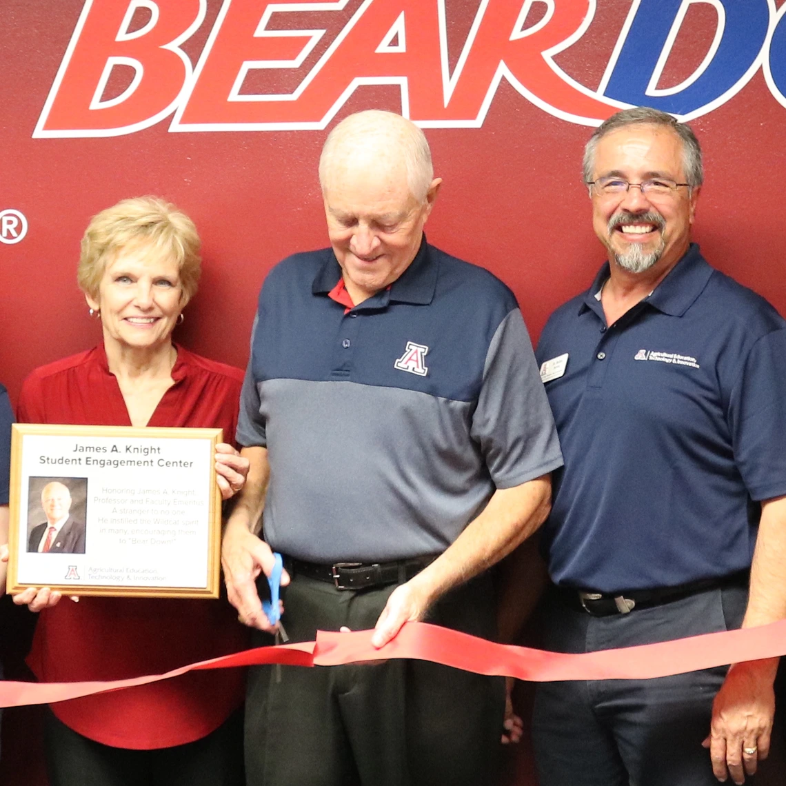 Picture of James A Knight cutting ribbon