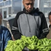 Picture of participants of the  Veterans Agricultural Education and Apprenticeship Program holding lettuce